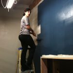 Building Ultimate Studios, Inc - Lizzy painting the Control Room wall